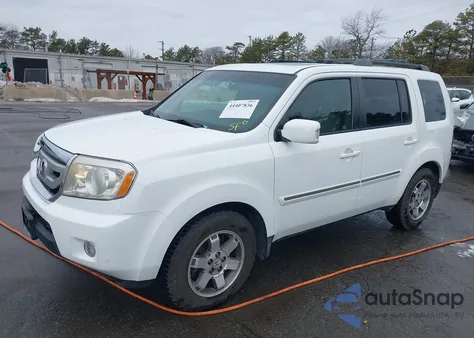2009 Honda Pilot Touring z USA, uszkodzony, nr VIN 5FNYF48959B053187